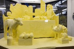 The sculpture, titled “A Table for All: Pennsylvania Dairy Connects Communities” was created by Montgomery County artists Jim Victor and Marie Pelton, who spent the past two weeks inside the refrigerated display building shaping 1,000 lbs. of donated butter.