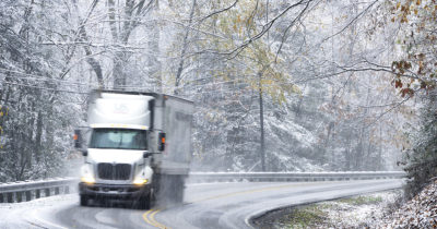 Truck driving in snow and ice