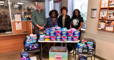 Senator Tim Kearney and state Rep. Gina H. Curry pose for a picture with Christine Joy Brunson, Executive Director of Purple House Project PA, Inc., and Nhakia Outland, Founder and Executive Director of Prevention Meets Fashion during their visit to the Upper Darby WIC to drop off donated feminine hygiene products on Friday.