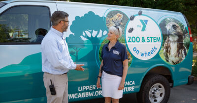 State Senator Carolyn Comitta visits the YMCA’s new “Zoo & STEM on Wheels” van with Brian Raicich, Executive Director of the Upper Main Line YMCA. Comitta successfully secured $50,000 in state grant funding for the program, which brings environmental education and STEM programs to children enrolled in childcare, after school, and camp programs throughout the area.